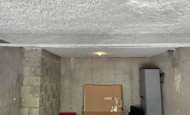 Projection de laine de roche dans garages