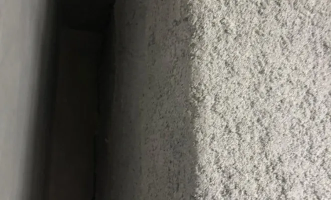 Projection de laine de roche sur gaine de ventilation à Grenoble par SIP