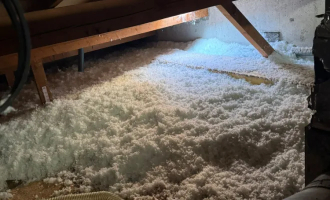 Isolation de combles perdus en laine de verre soufflée par SIP Société d'Isolation Projetée à Annecy