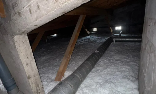 Isolation de combles perdus en laine de verre soufflée par SIP Société d'Isolation Projetée à Annecy