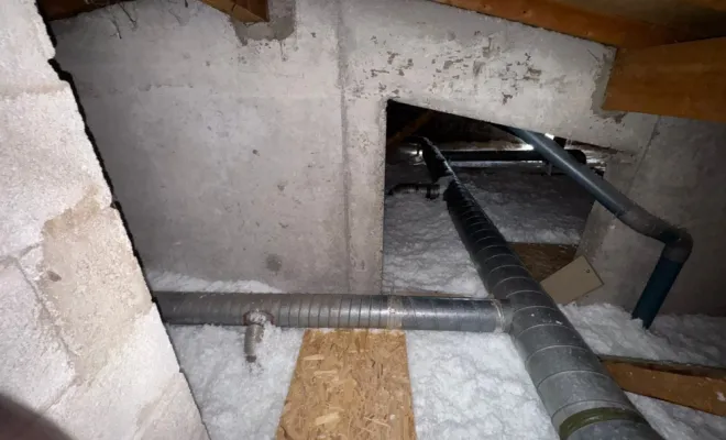 Isolation de combles perdus en laine de verre soufflée par SIP Société d'Isolation Projetée à Annecy